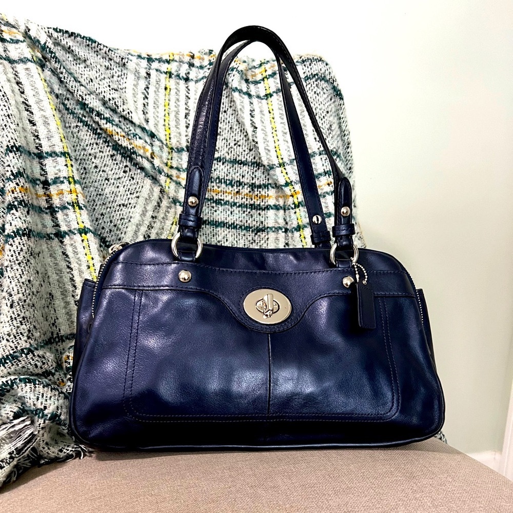Like new classic navy blue coach purse with silver hardware.
